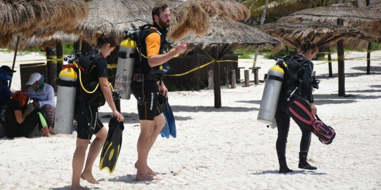 Invitan a turistas a despertar en Puerto Morelos