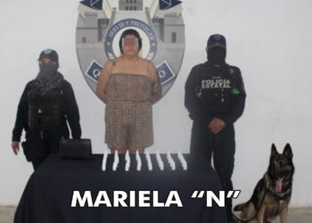 Detienen a hija de notario público cuando intentaba cruzar a Isla Mujeres con droga líquida